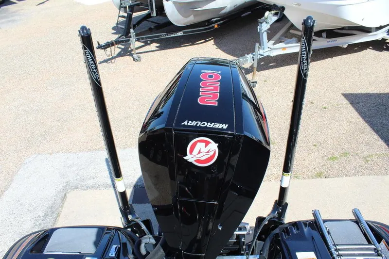 Slide: The Image of 2021 Bass Cat Cougar FTD with Mercury engine, featuring dual Power-Pole anchors. - 17