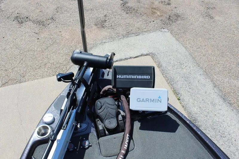 Slide: The Image of 2021 Bass Cat Cougar FTD boat with Humminbird and Garmin electronics on the deck. - 22