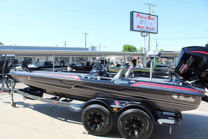 Slide: The Image of 2021 Bass Cat Cougar FTD boat at dealership, side view, on trailer. - 9