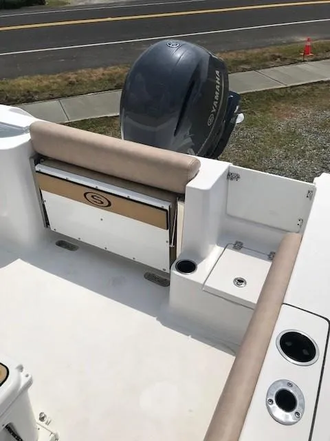 Slide: The Image of 2020 Sportsman Open 232 Center Console boat interior with Yamaha engine. - 16