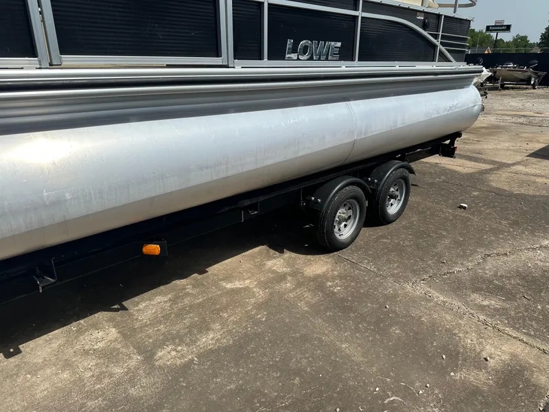 Slide: The Image of 2014 Lowe SF214 Sport Fish pontoon boat on a trailer. - 7