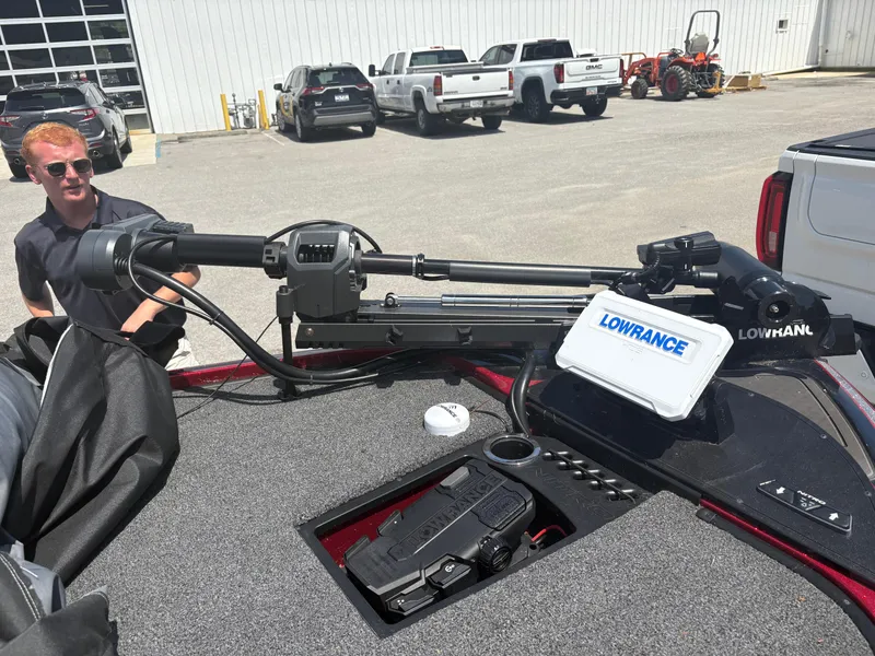 Slide: The Image of 2024 Nitro Z19 boat with Lowrance equipment, parked outdoors. - 10