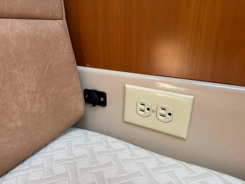 Slide: The Image of Power outlet and seating in 2014 Cutwater C-28 Coupe interior. - 32