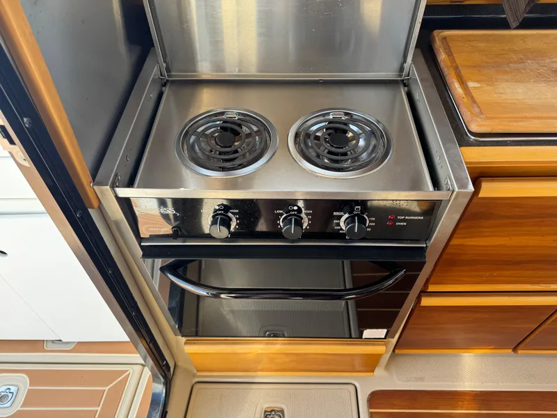 Slide: The Image of Stainless steel stove in 2014 Cutwater C-28 Coupe boat kitchen. - 42