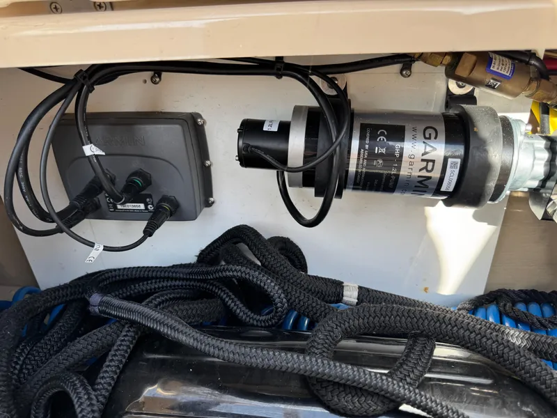 Slide: The Image of 2014 Cutwater C-28 Coupe boat equipment with Garmin device and ropes. - 47