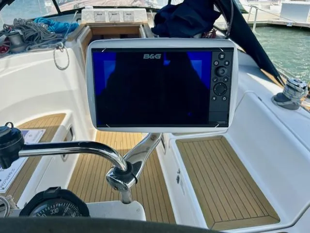 Slide: The Image of B&G navigation system on 2007 Hanse 400 sailboat cockpit, featuring teak flooring. - 10