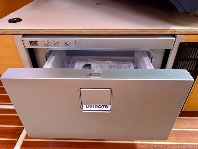 Slide: The Image of Isotherm refrigerator drawer in a 2007 Hanse 400 yacht interior. - 26