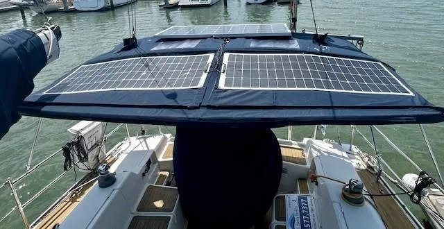 Slide: The Image of Sailboat with solar panels on deck, Hanse 400, 2007 model, docked at marina. - 7
