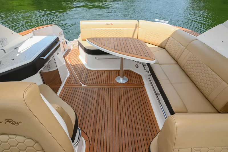 Slide: The Image of 2020 Sea Ray Sundancer 320 Coupe interior with elegant seating and wooden flooring. - 15