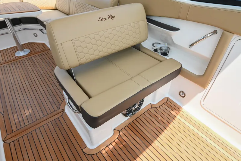 Slide: The Image of 2020 Sea Ray Sundancer 320 Coupe interior with tan seating and teak flooring. - 34