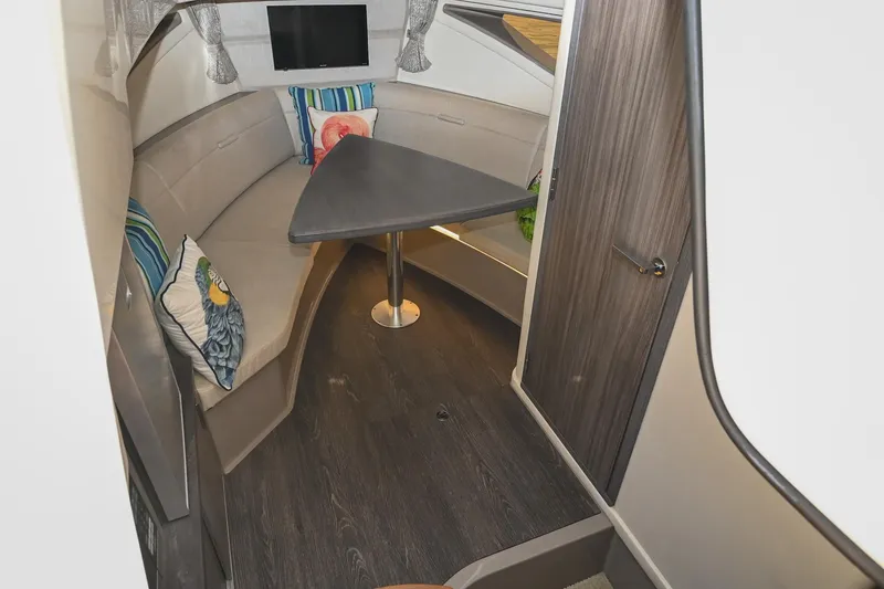 Slide: The Image of Interior of 2020 Sea Ray Sundancer 320 Coupe with seating and table. - 48