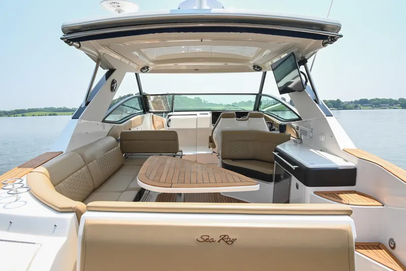Slide: The Image of 2020 Sea Ray Sundancer 320 Coupe interior with luxurious seating and modern amenities. - 8