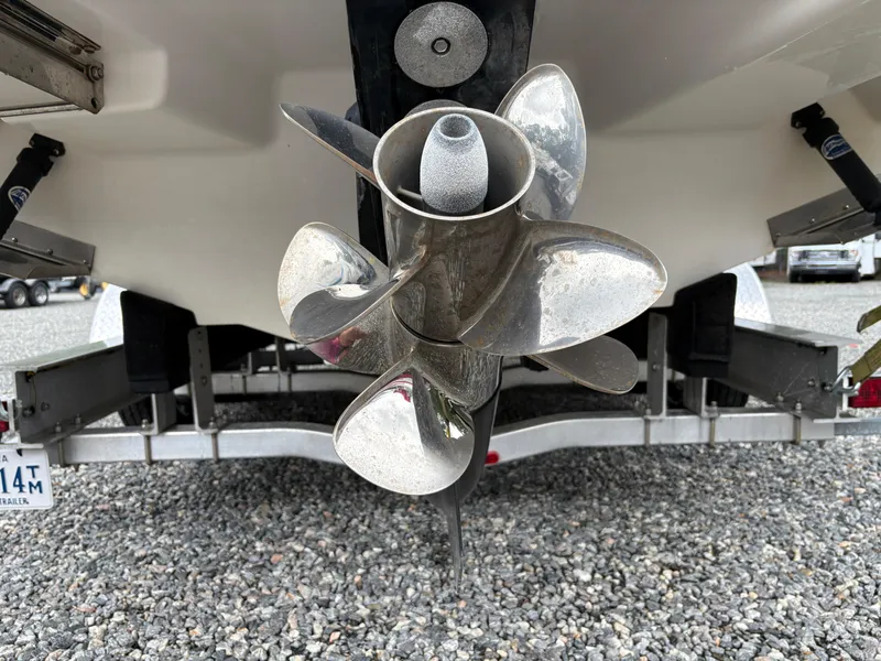 Slide: The Image of Propeller of a 2011 Sea Ray 270 SLX boat on a trailer. - 4