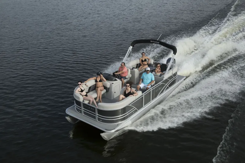The Image of Sylvan Mirage 8522 pontoon boat 2026 on water with passengers. - 0