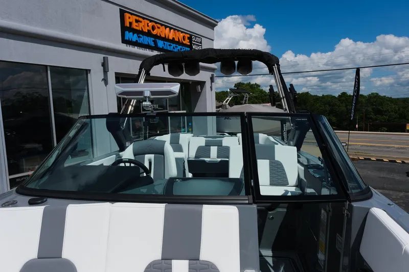 Slide: The Image of 2025 MasterCraft X26 boat at Performance Marine, showcasing sleek design and modern features. - 25