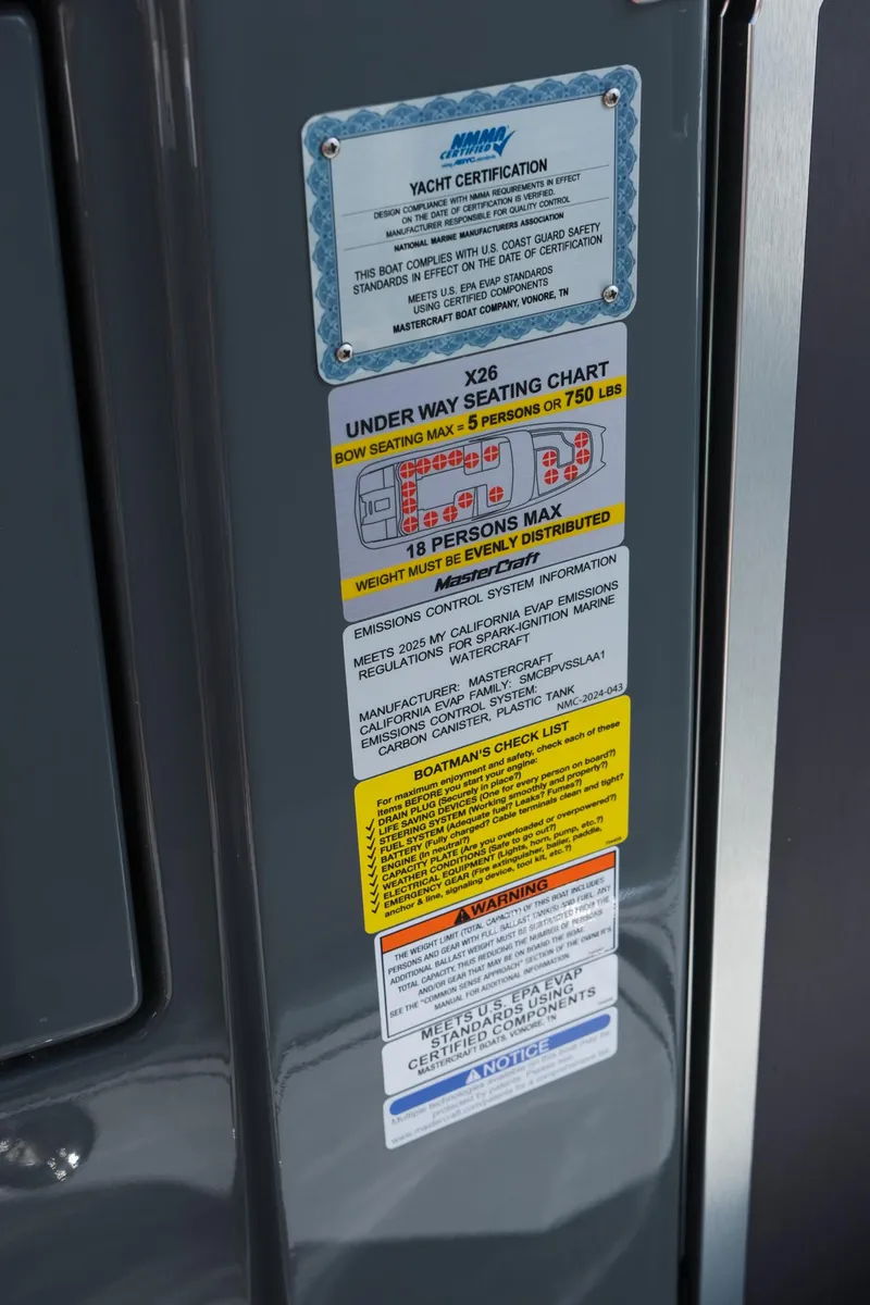 Slide: The Image of 2025 MasterCraft X26 yacht certification and seating capacity labels. - 32