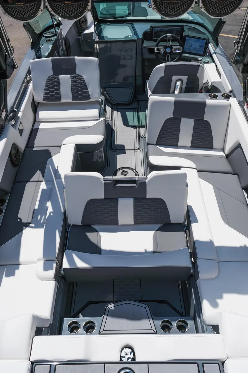 Slide: The Image of 2025 MasterCraft X26 boat interior with luxurious seating and modern design. - 36