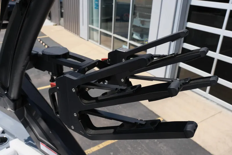 Slide: The Image of 2025 MasterCraft X26 boat with advanced wakeboard rack system. - 42