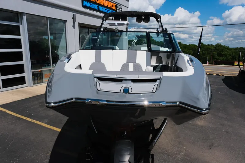 Slide: The Image of 2025 MasterCraft X26 boat displayed outdoors, showcasing sleek design and modern features. - 48