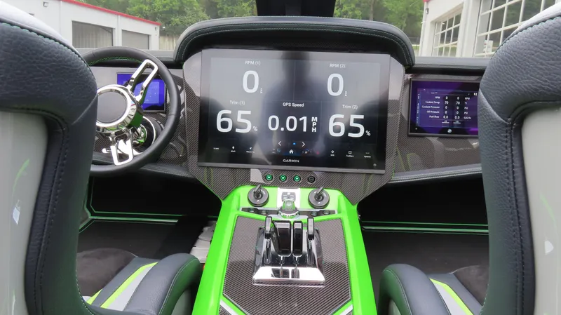 Slide: The Image of 2025 Outerlimits 46 SC dashboard with digital displays and modern controls. - 25