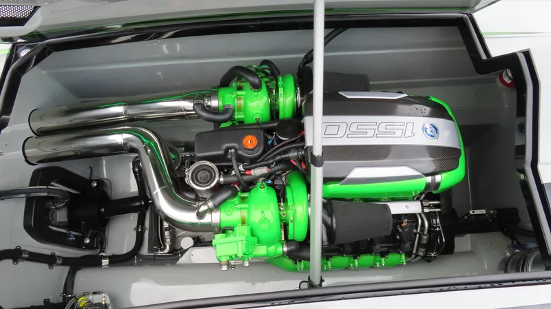 Slide: The Image of 2025 Outerlimits 46 SC engine compartment with vibrant green components and sleek design. - 31