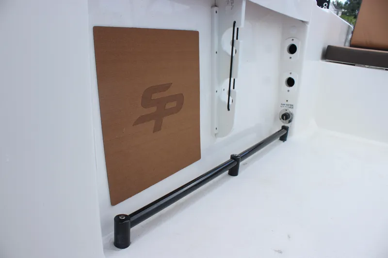 Slide: The Image of 2025 Sea Pro 245 FLX boat interior detail with logo and fittings. - 14