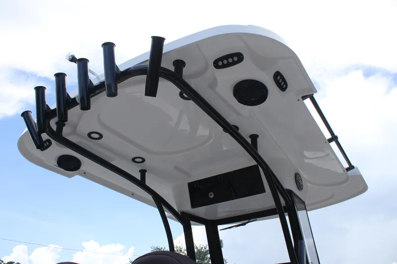 Slide: The Image of 2025 Sea Pro 245 FLX boat top view with rod holders and speakers. - 27