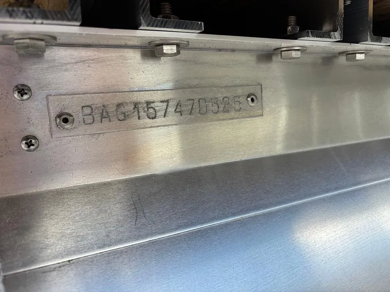 Slide: The Image of 2025 Bentley Pontoons Elite 253 Swingback Tritoon hull identification number plate. - 31