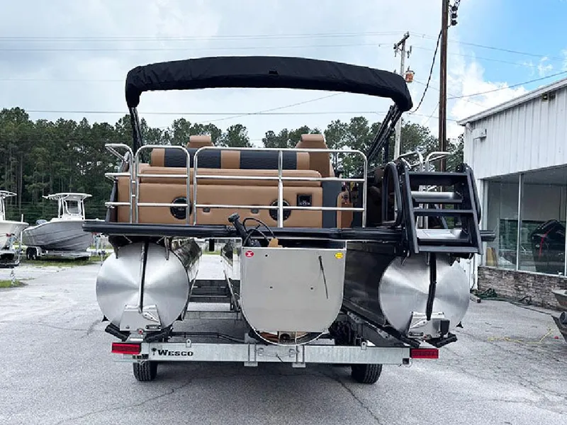 Slide: The Image of 2025 Bentley Pontoons Elite 253 Swingback Dual Captain Full Tritoon on trailer, rear view. - 7