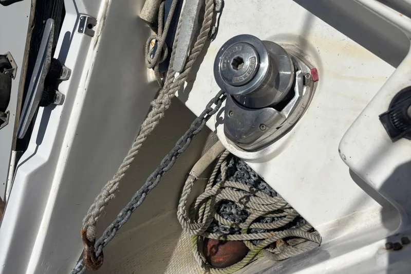 Slide: The Image of Anchor winch and ropes on a 1999 Hunter 410 sailboat deck. - 13