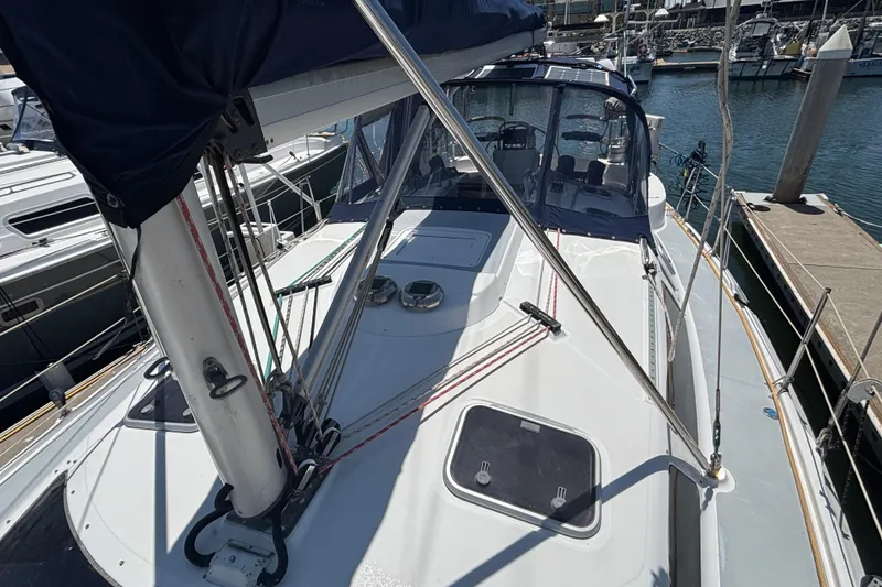 Slide: The Image of Sailboat deck view of 1999 Hunter 410 model docked at marina. - 16