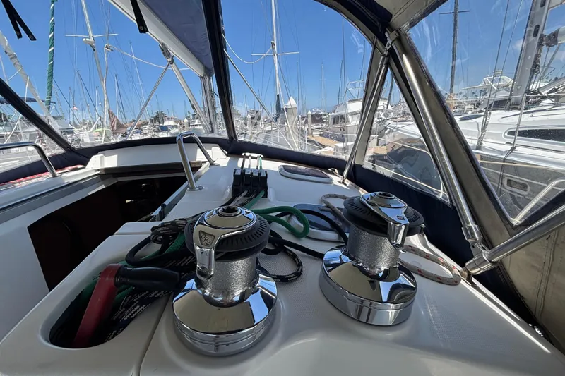 Slide: The Image of Cockpit view of a 1999 Hunter 410 sailboat with winches and ropes. - 30