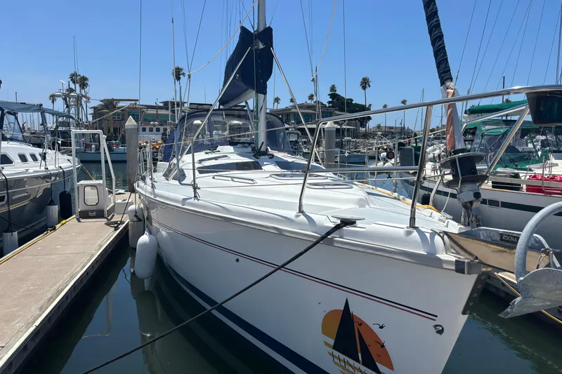 Slide: The Image of Sailboat docked at marina, 1999 Hunter 410 model, sunny day, calm waters. - 7