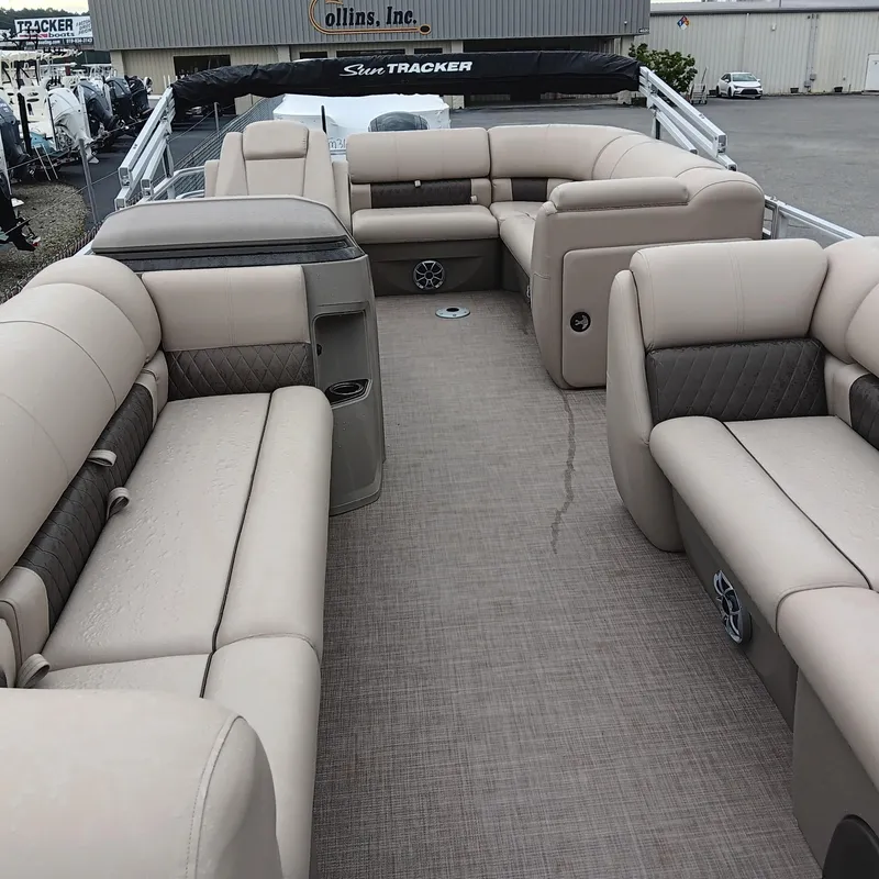 Slide: The Image of 2025 Sun Tracker Party Barge 20 DLX with spacious seating and modern design. - 6