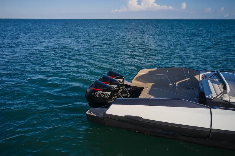 Slide: The Image of 2025 Anvera 42 Speedster boat on open sea with powerful engines. - 12