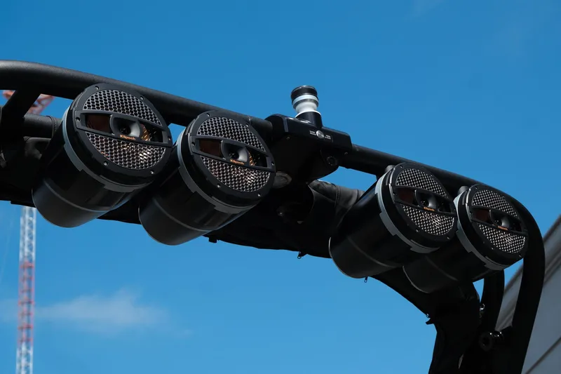 Slide: The Image of 2025 MasterCraft XT24 boat speakers against a clear blue sky. - 11