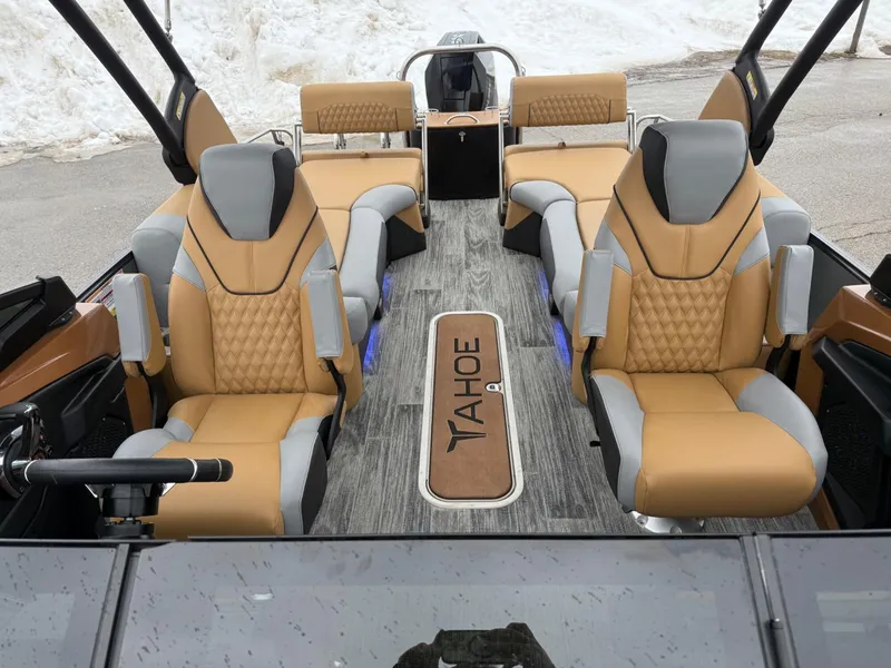 Slide: The Image of 2025 Tahoe Pontoon Grand Tahoe LTD Quad Lounge interior with luxurious seating and modern design. - 10