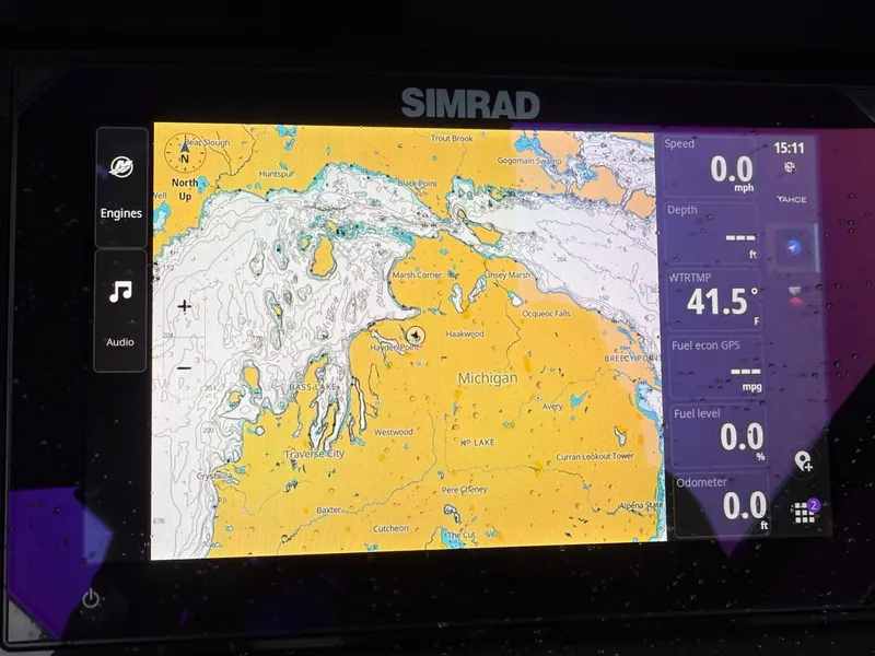 Slide: The Image of Simrad navigation display showing Michigan map on 2025 Tahoe Pontoon Grand Tahoe LTD. - 17