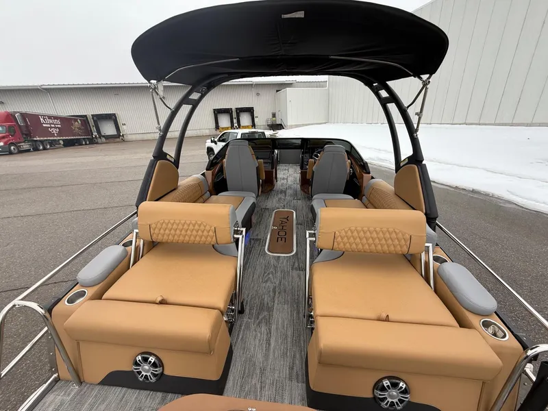 Slide: The Image of 2025 Tahoe Pontoon Grand Tahoe LTD Quad Lounge Windshield with luxurious seating and sleek design. - 21