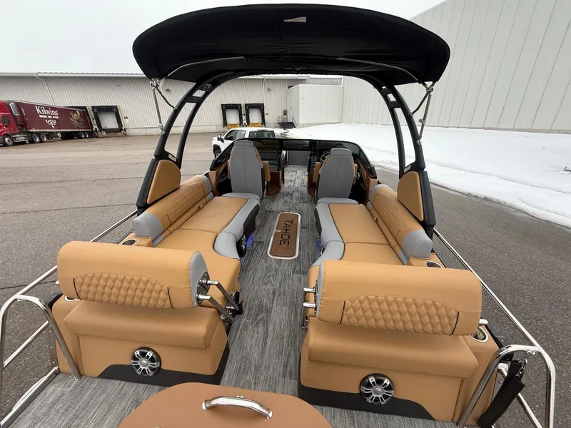 Slide: The Image of 2025 Tahoe Pontoon Grand Tahoe LTD Quad Lounge Windshield with luxurious seating and sleek design. - 22