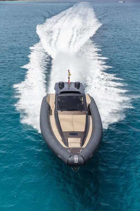 Slide: The Image of Anvera 48 yacht cruising on clear blue water, 2025 model. - 3