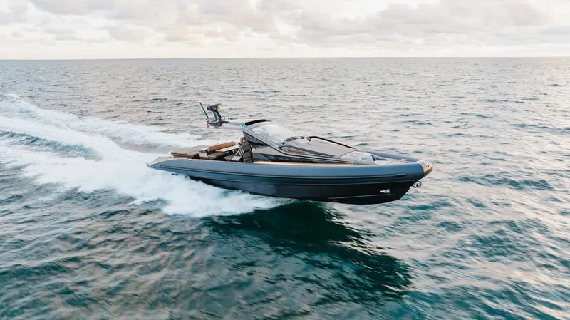 The Image of 2025 Anvera 48 luxury boat cruising on open sea under cloudy sky. - 0