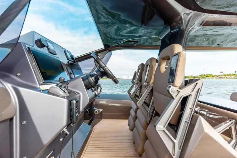 Slide: The Image of Interior of 2025 Anvera 48 yacht, featuring modern cockpit and luxurious seating. - 20