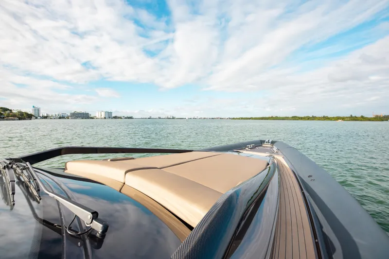 Slide: The Image of Anvera 48 yacht cruising on open water under a partly cloudy sky, 2025 model. - 22