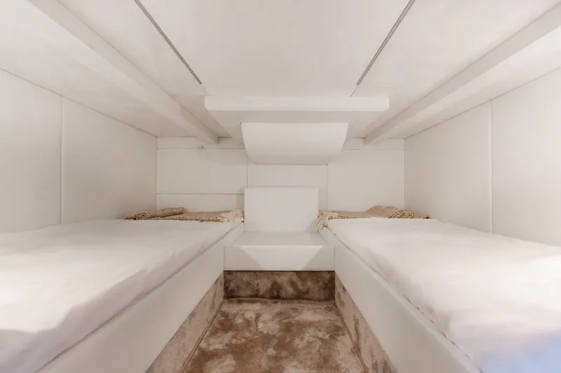 Slide: The Image of Interior of 2025 Anvera 48 yacht with twin beds and modern design. - 25