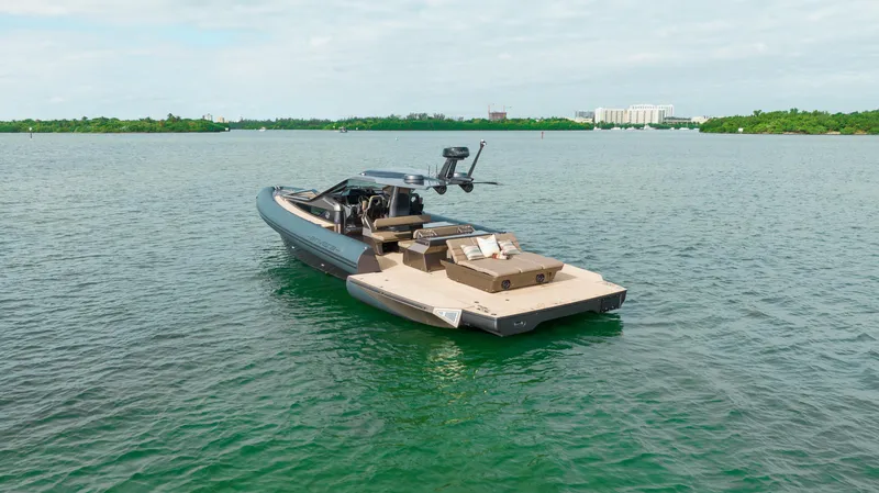 Slide: The Image of Luxury Anvera 48 yacht on serene water, 2025 model, showcasing sleek design and spacious deck. - 30