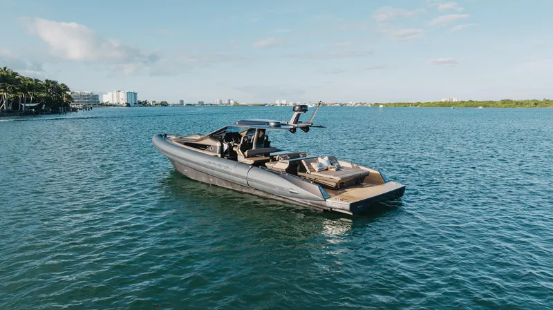 Slide: The Image of Anvera 48 luxury yacht cruising on a serene blue sea, 2025 model. - 33