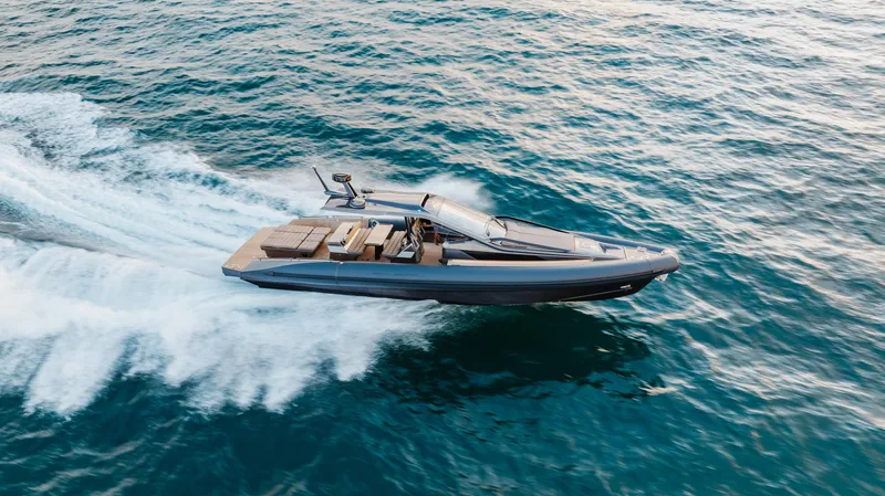 Slide: The Image of 2025 Anvera 48 yacht cruising on open sea, showcasing sleek design and speed. - 36