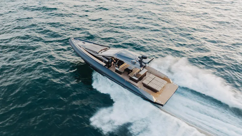 Slide: The Image of Anvera 48 luxury yacht cruising on open water, 2025 model. - 37