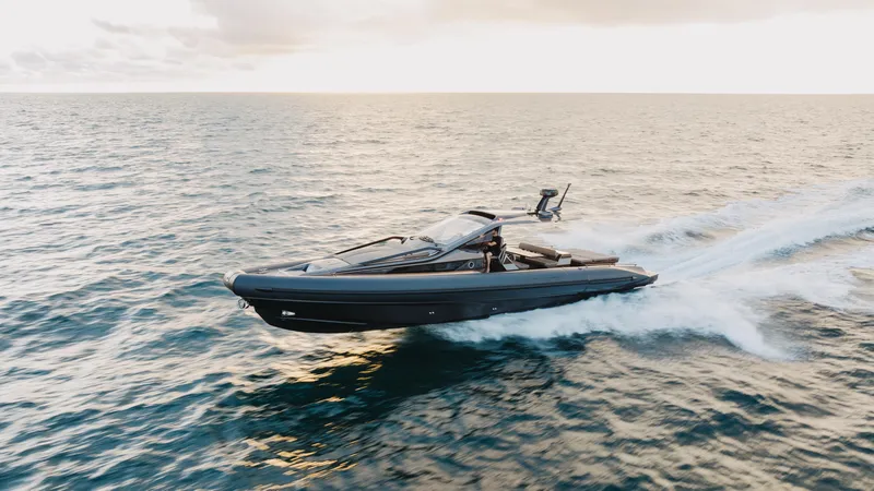 Slide: The Image of 2025 Anvera 48 yacht cruising on open sea at sunset. - 38